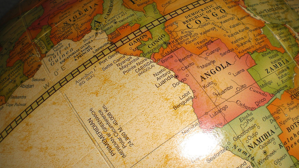 Close-up of a vintage globe showing Angola, Zambia and Namibia in southern Africa